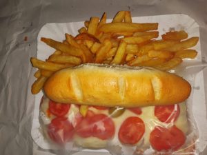 Milanesa-Napolitana-con-Fritas-y-Pan-Casero-1599x1200