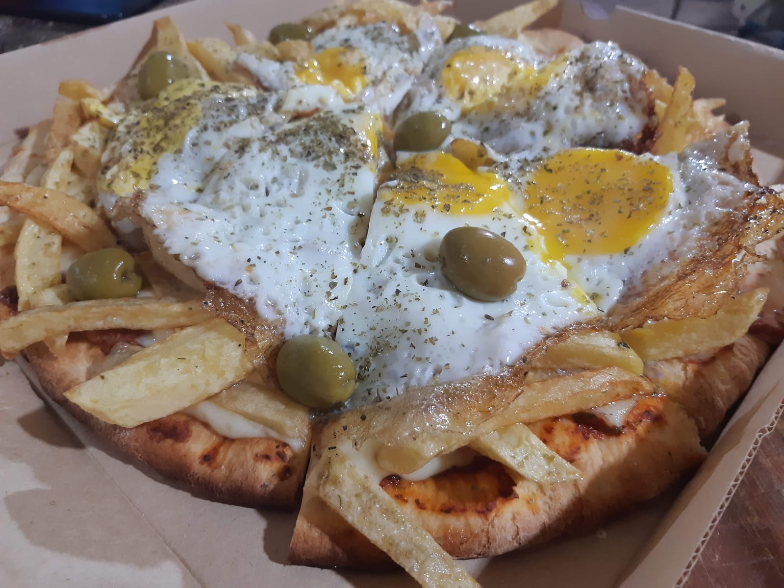 Pizza de la Casa 12 Porciones